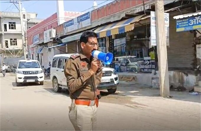 नूंह में परीक्षा केंद्र पर सख्ती, पुलिस का कड़ा पहरा – दुकानें बंद, लाउडस्पीकर से दी गई चेतावनी