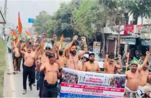 PGI रोहतक के कच्चे कर्मचारियों का प्रदर्शन: जंजीरों में बंधे हाथ-पैर, सड़कों पर आंदोलन